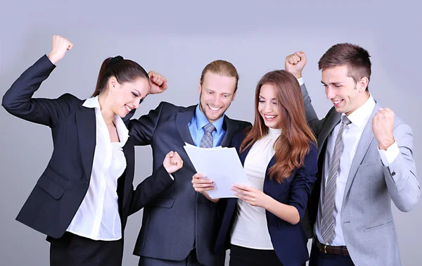 Business team on grey background — Stock Photo, Image