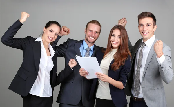 Business team on grey background — Stock Photo, Image