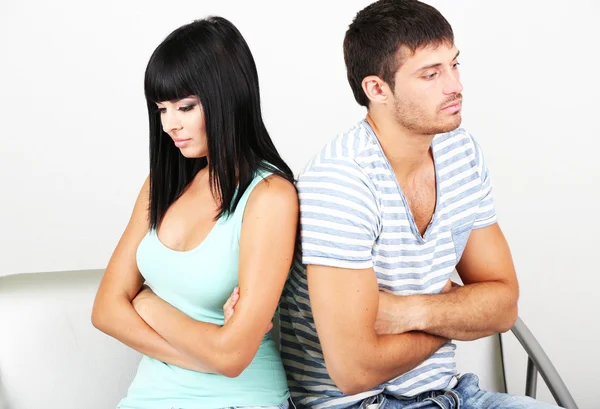 Beautiful loving couple quarrel in room — Stock Photo, Image