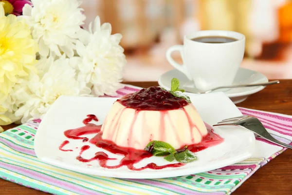 Panna Cotta with raspberry sauce, on bright background — Stock Photo, Image