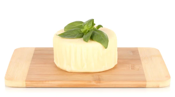 Cheese mozzarella and basil on cutting board isolated on white — Stock Photo, Image