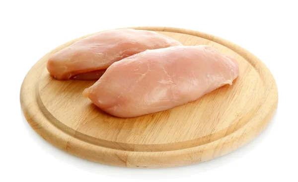 Råt kyllingekød på skærebrættet, isoleret på hvidt - Stock-foto
