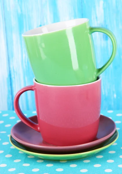 Two cups on blue background — Stock Photo, Image