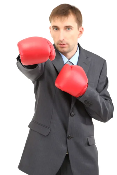 Hombre de negocios en guantes de boxeo aislados en blanco — Foto de Stock