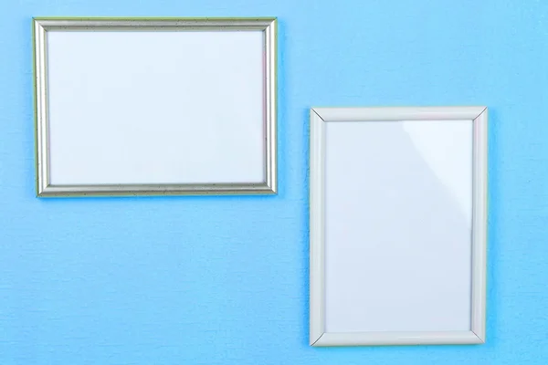 Photo frames on wall background — Stock Photo, Image