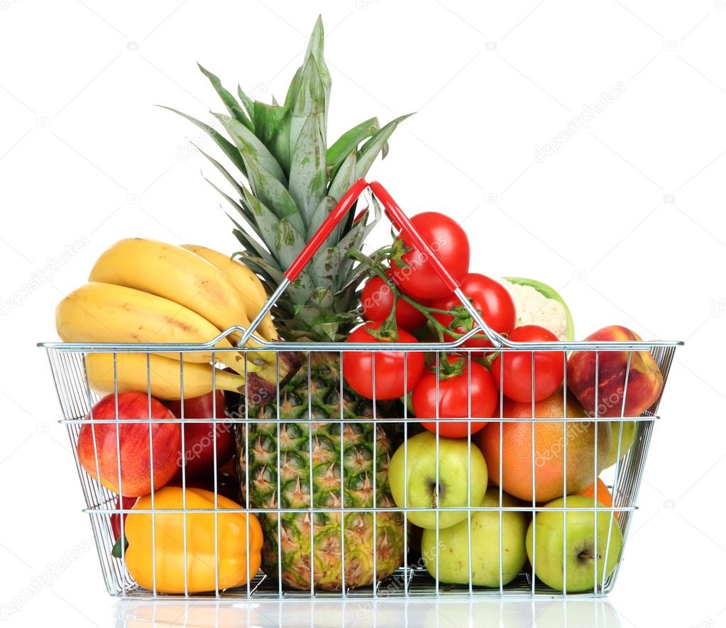 Assortment of fresh fruits and vegetables in metal basket, isolated on white