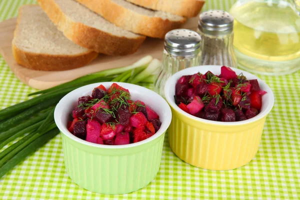 Beet salad in bowls on table close-up — Stock Photo, Image