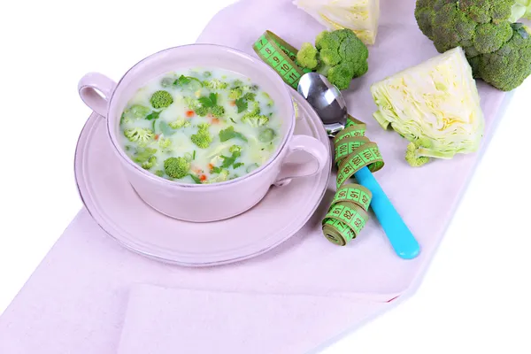 Sopa de col en plato en servilleta aislada en blanco —  Fotos de Stock