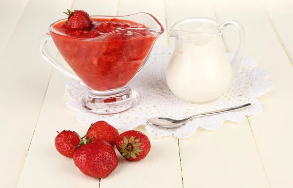 Homemade strawberry jam, on color wooden background — Stock Photo, Image