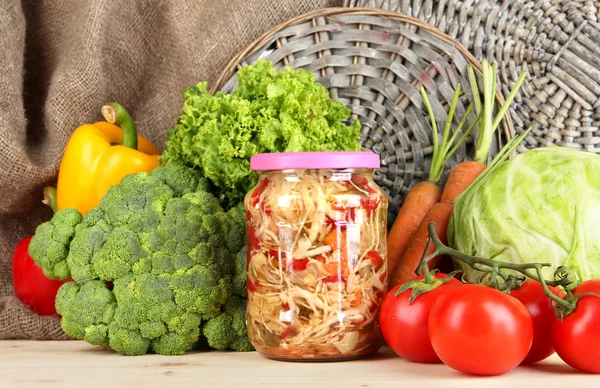 Fresh vegetables and canned on table close up — Stock Photo, Image