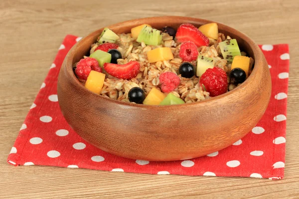 Oatmeal with fruits on table close-up — Stock Photo, Image