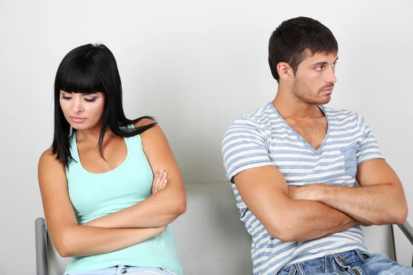 Beautiful loving couple quarrel in room — Stock Photo, Image