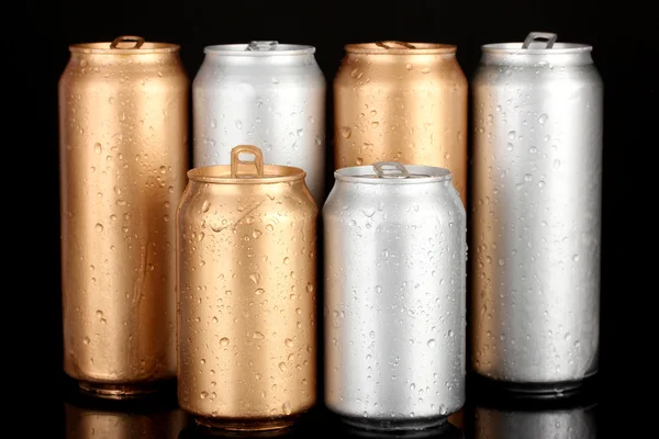 stock image Aluminum cans with water drops isolated on black