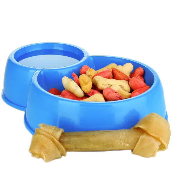 Dry dog treats in bowl isolated on white — Stock Photo, Image