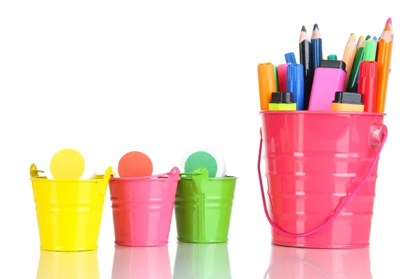 Gouache paint, pens and markers of various colors in baskets isolated on white — Stock Photo, Image