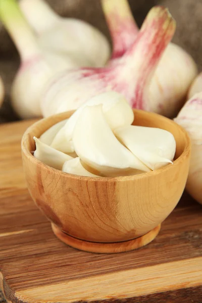 Fresh garlic, on sackcloth background — Stok fotoğraf