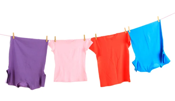 Linha de lavanderia com roupas isoladas em branco — Fotografia de Stock