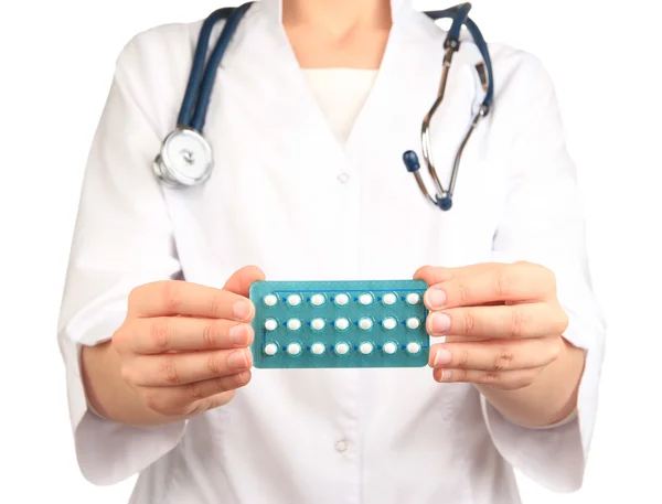 Hormonal pills in hands of doctor isolated on white — Stock Photo, Image