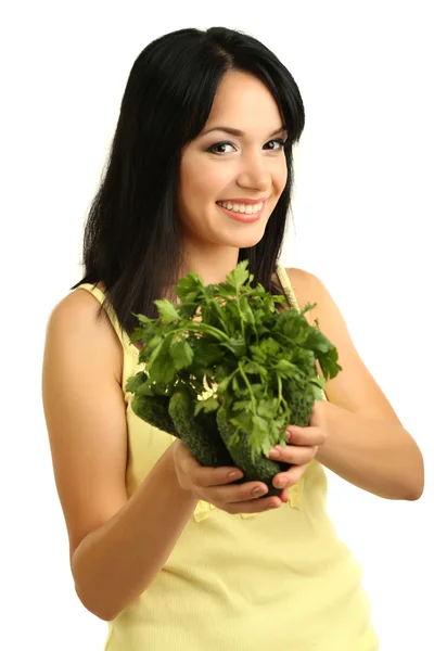 Girl with fresh cucumbers and greens isolated on white — Stock Photo, Image