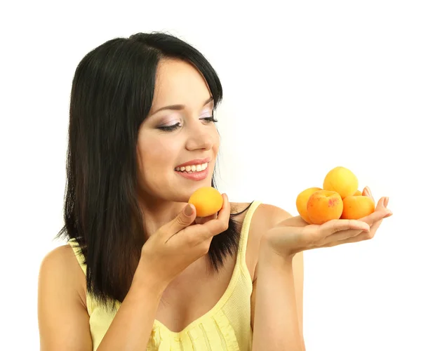 Flicka med färska aprikoser isolerad på vit — Stockfoto