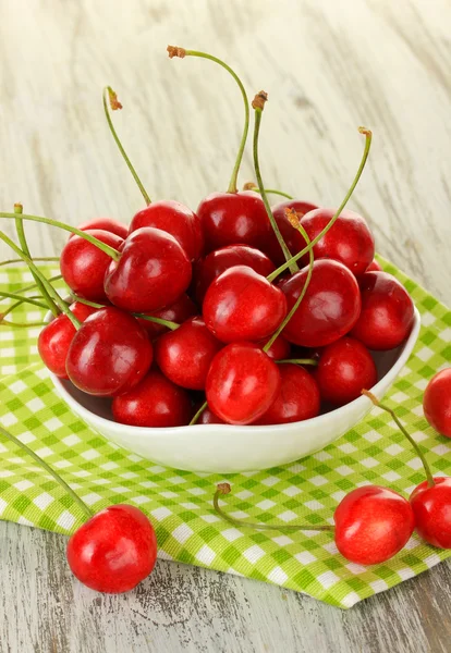 Cherry berries on wooden table close up — Stock Photo, Image