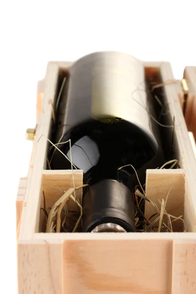 Wine bottle in wooden box, isolated on white — Stock Photo, Image