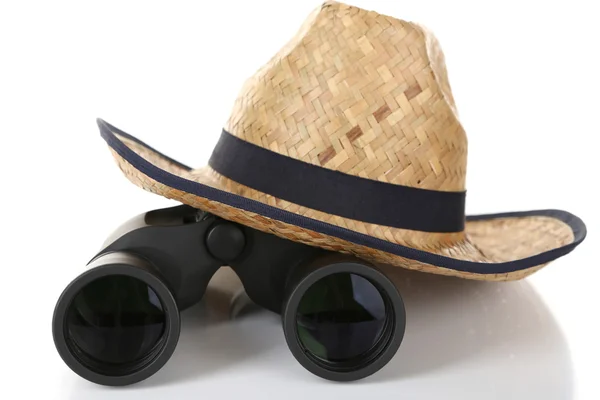 Black modern binoculars with straw hat isolated on white — Stock Photo, Image