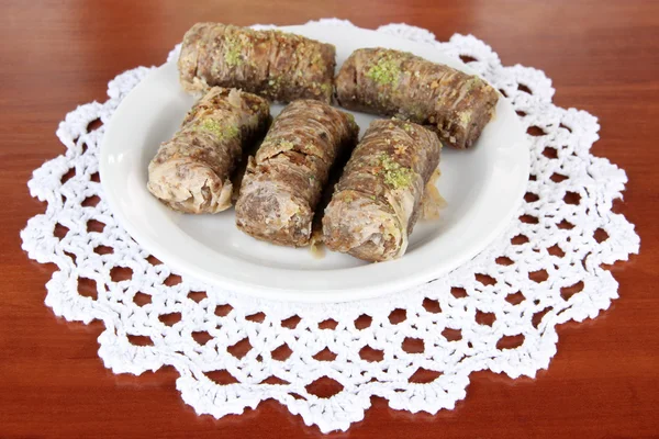 Sweet baklava on plate on table close-up — Stock Photo, Image