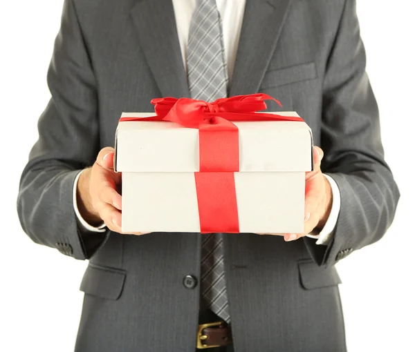 Joven hombre de negocios presente caja de regalo, aislado en blanco — Foto de Stock