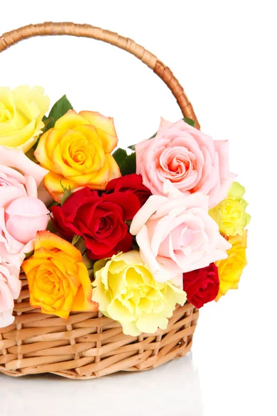Beautiful bouquet of roses in wicker basket isolated on white — Stock Photo, Image