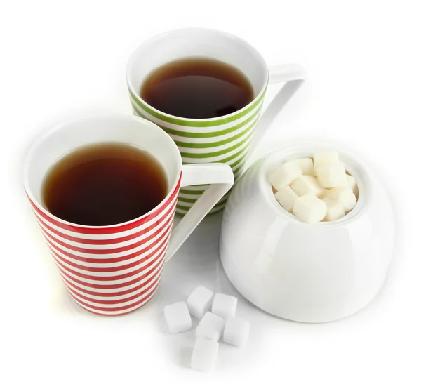 Teetasse und Zuckerdose auf weißem Hintergrund — Stockfoto