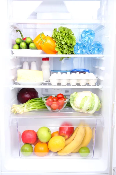 Refrigerator full of food Stock Picture