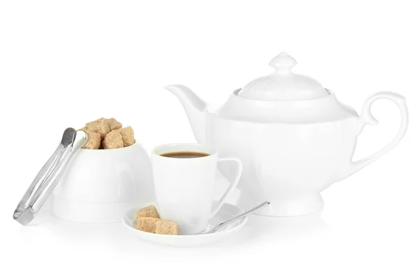 Cup of coffee, sugar-bowl and teapot isolated on white Stock Image