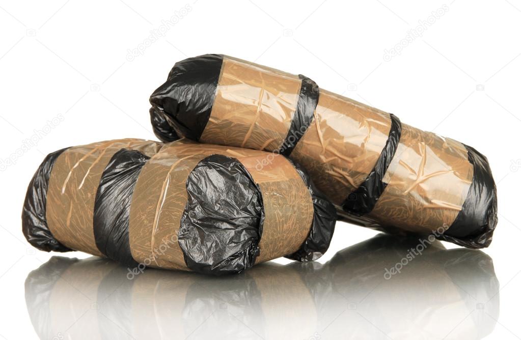 Packages of narcotics on gray background