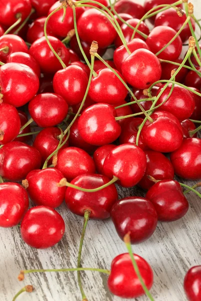 Cherry berries on wooden table — Stock Photo, Image