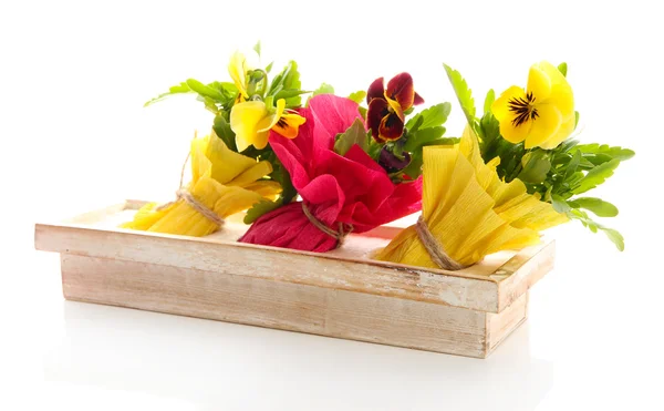 Beautiful spring flowers in wooden crate isolated on white — Stock Photo, Image