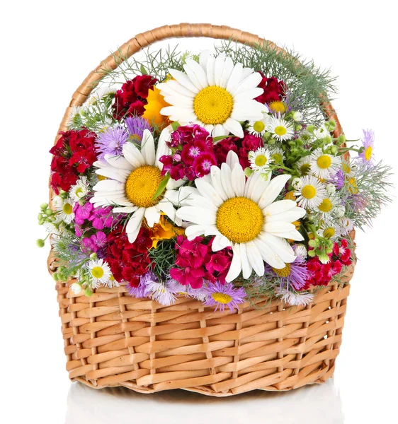 Beautiful bright flowers in wicker basket isolated on white — Stock Photo, Image