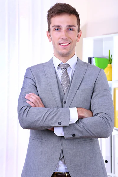 Businessman standing in office — Stock Photo, Image