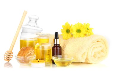 yağlar ve üzerinde beyaz izole bal kokulu bal spa