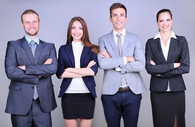 iş takım ayakta satırında gri arka plan üzerinde