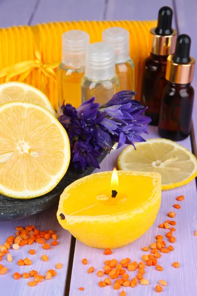 Romantic lighted candles on wooden table close up — Stock Photo, Image