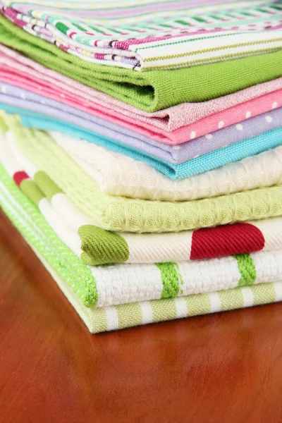 Kitchen towels, on wooden background — Stock Photo, Image