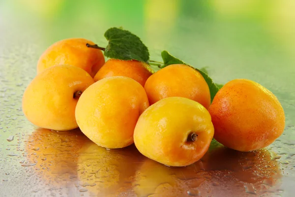 Apricots on nature background — Stock Photo, Image
