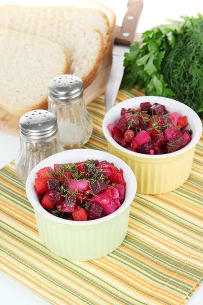 Beet salad in bowls on table close-up — Stock Photo, Image