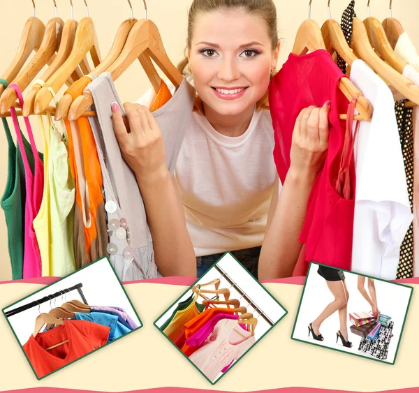 Beautiful young woman near rack with hangers — Stock Photo, Image