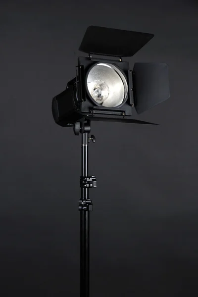 Studio lighting on black background close-up — Stock Photo, Image