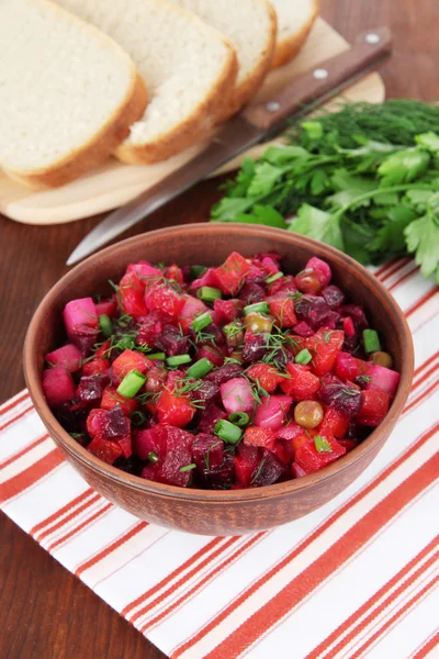 Beet salad in bowl on table close-up — Stock Photo, Image