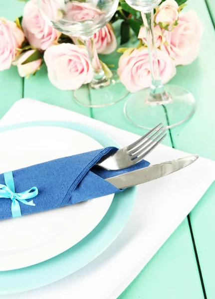 Table serving on a wooden background — Stock Photo, Image