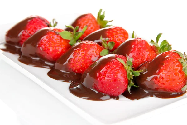 Strawberry dipped in chocolate fondue isolated on white — Stock Photo, Image