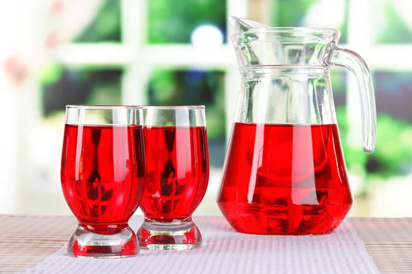 Glasses compote on table on window background — Stock Photo, Image